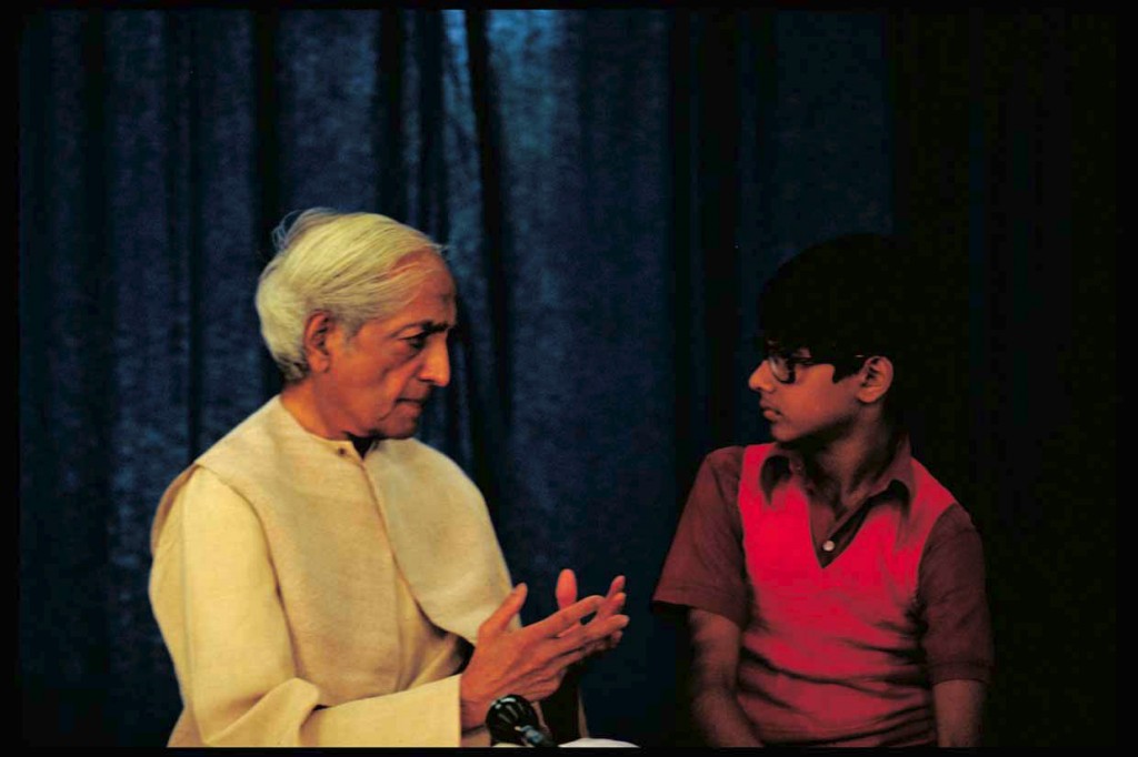 Krishnaji with a Rishi Valley student.